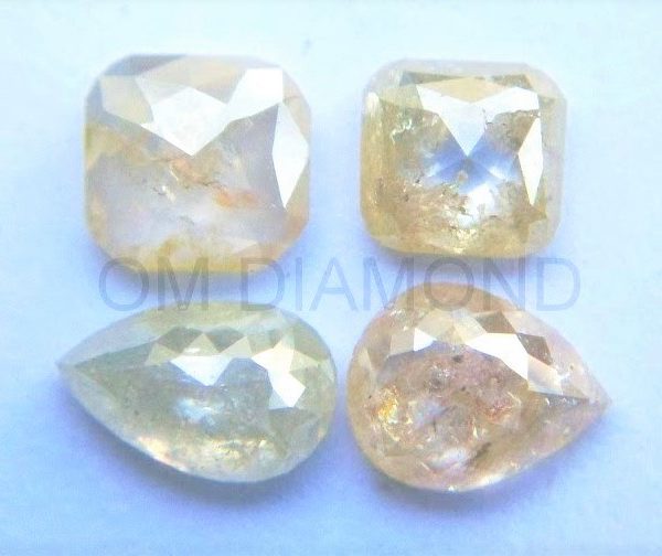 Pairs of Icy-White Fancy Shape Diamonds